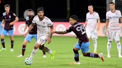 Colorado Rapids vs. Real Salt Lake: Marcelo Silva of Real Salt Lake (left) carries the ball past Andre Shinyashiki of Colorado Rapids (Getty).
