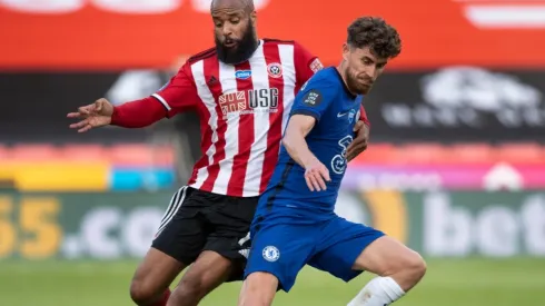 Jorginho of Chelsea and David McGoldrick of Sheffield United. (Getty)
