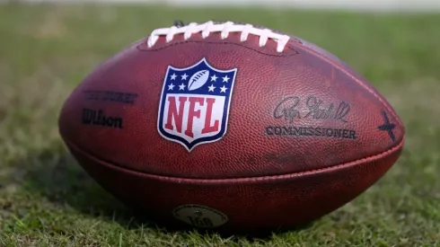 A detailed view of the NFL logo on a football prior to a game.
