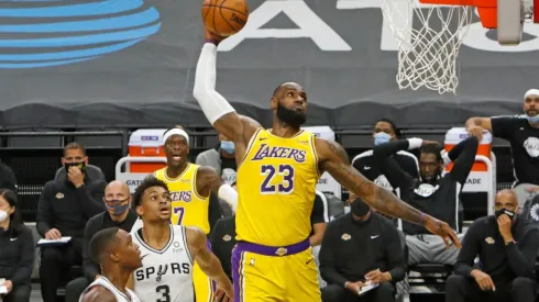 LeBron James going for the ball during a game vs Spurs. (Getty)
