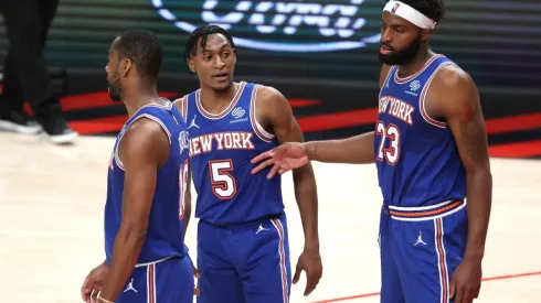 Alec Burks, Immanuel Quickley and Mitchell Robinson of the New York Knicks. (Getty)
