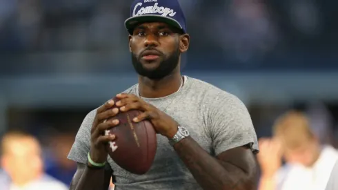 LeBron James played football in high school. (Getty)
