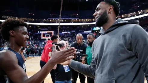 Bronny James and his father LeBron James. (Getty)
