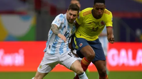 Lionel Messi of Argentina and Yerry Mina of Colombia fighting for the ball. (Getty)