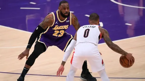 LeBron James guarding Damian Lillard. (Getty)
