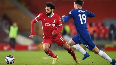 Mohamed Salah of Liverpool (left) is challenged by Mason Mount of Chelsea during the Premier League match (Getty).
