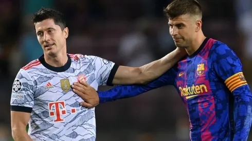 Robert Lewandowski of Bayern (l) and Gerard Pique of Barcelona. (Getty)