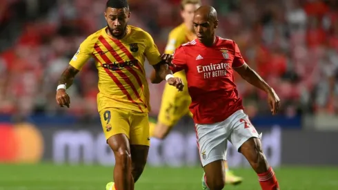 Memphis Depay of Barcelona against Joao Mario of Benfica.
