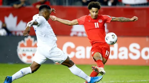 Tajon Buchanan #11 of Canada has a shot on goal