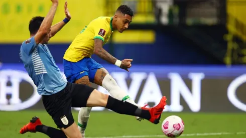 Raphinha of Brazil scores against Uruguay.
