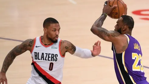 Damian Lillard guarding LeBron James
