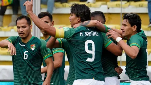 Bolivia players celebrate.