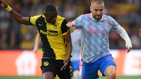 Luke Shaw of Manchester United (right) and Christopher Martins Pereira of Young Boys (left)
