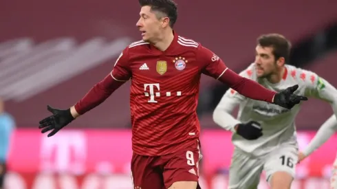 Robert Lewandowski gestures during a Bundesliga match
