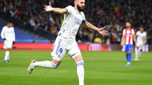 Karim Benzema celebrates scoring the opening goal agains Atletico Madrid
