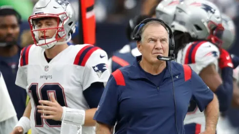 New England Patriots coach Bill Belichick (R) and quarterback Mac Jones.
