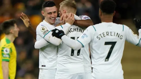 Manchester City's players celebrate after scoring
