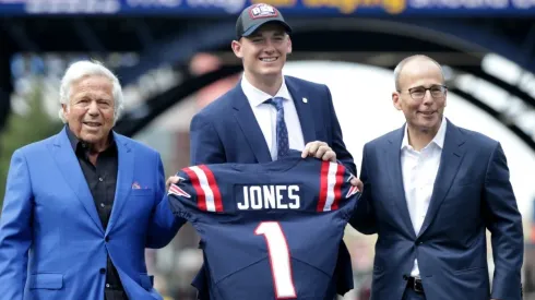 Mac Jones, Robert Kraft, and Jonathan Kraft
