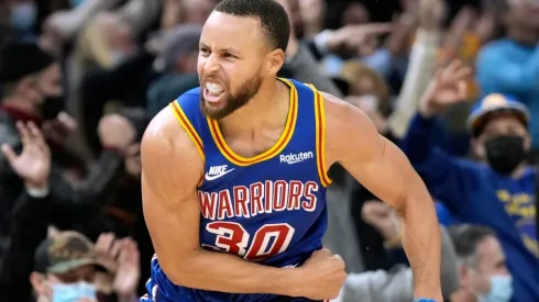 Stephen Curry of the Golden State Warriors reacts after making a three-point shot against the Memphis Grizzlies
