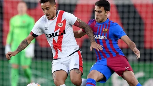 Óscar Trejo of Rayo Vallecano and Eric Garia of Barcelona
