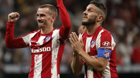 Antoine Griezmann (L) and Koke of Atletico Madrid