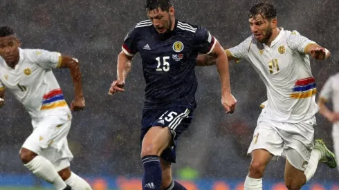 Scott McKenna of Scotland controls the ball during the match between Scotland and Armenia
