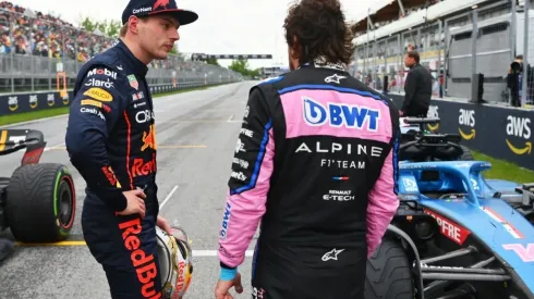 Pole position qualifier Max Verstappen of Red Bull Racing talks with Second placed qualifier Fernando Alonso of Alpine
