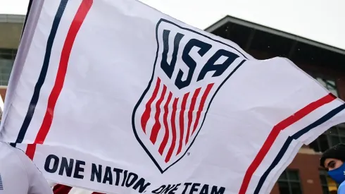USMNT fans with flag
