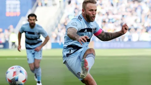 Johnny Russell scores a penalty kick during MLS Playoff.
