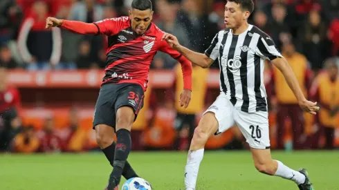 Pedro Rocha of Athletico Paranaense and Hernesto Caballero of Libertad
