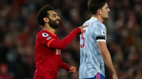 Mo Salah of Liverpool and Harry Maguire of Manchester United