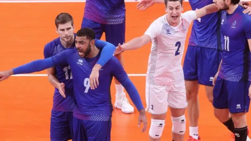 Earvin Ngapeth of Team France reacts with team mates
