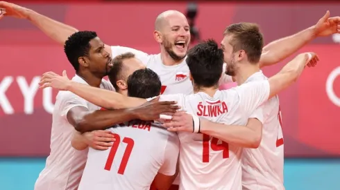 Bartosz Kurek of Team Poland reacts with team mates
