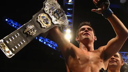 Dominick Cruz celebrates defeating T.J. Dillashaw to win the World Bantamweight Championship