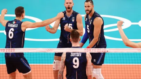 Riccardo Sbertoli of Team Italy reacts with team mates
