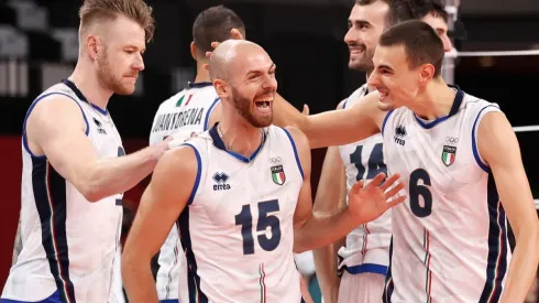 Riccardo Sbertoli of Team Italy reacts with team mates
