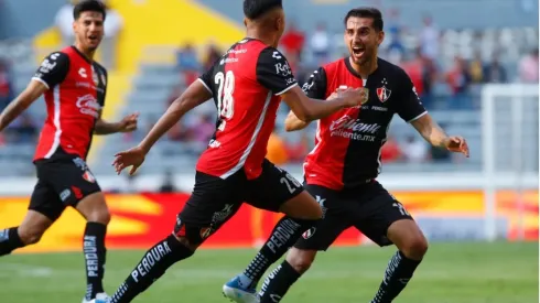 Christopher Trejo of Atlas celebrates with teammates
