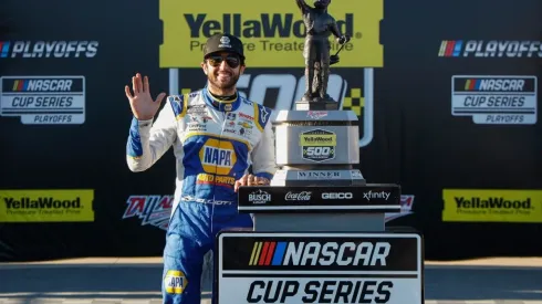 Chase Elliott celebrates after winning the YellaWood 500
