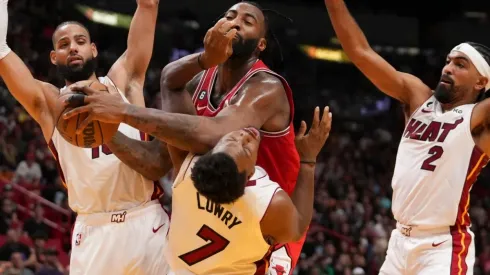 Andre Drummond of the Chicago Bulls fouls Kyle Lowry of the Miami Heat
