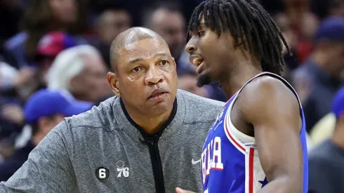 Head coach Doc Rivers speaks with Tyrese Maxey of the Philadelphia 76ers
