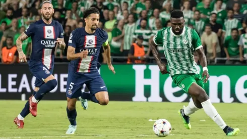 Frantzdy Pierrot of Maccabi Haifa FC competes for the ball with Marquinhos of Paris Saint Germain
