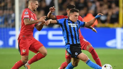 Ferran Jutgla of Club Brugge is challenged by Robert Andrich Bayer Leverkusen
