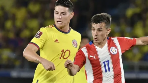 Andres Cubas of Paraguay and James Rodriguez of Colombia
