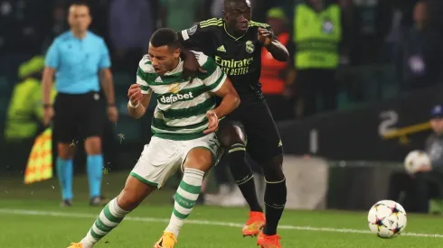 Giorgos Giakoumakis of Celtic battles for possession with Ferland Mendy of Real Madrid
