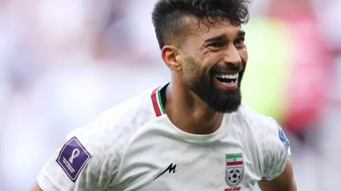 Ramin Rezaeian of IR Iran celebrates after scoring their team's second goal during the FIFA World Cup Qatar 2022 Group B match.