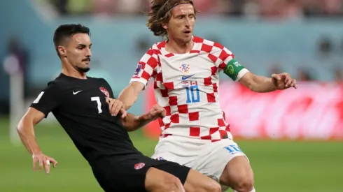 Luka Modric of Croatia and Stephen Eustaquio of Canada