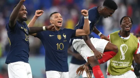 France striker Kylian Mbappe (10) celebrates with team mates
