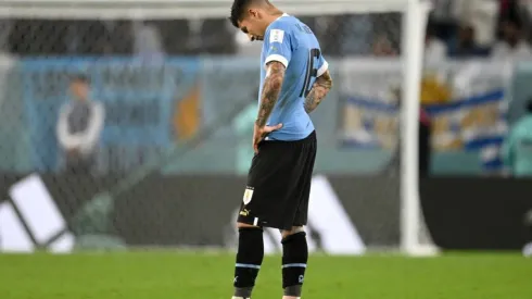 Mathias Olivera of Uruguay shows dejection after the team fails to qualify for the knockout stage