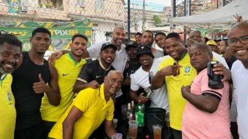 Adriano drinking with buddies
