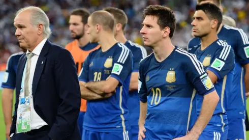 Head coach Alejandro Sabella of Argentina looks on with Lionel Messi after 2014 World Cup final